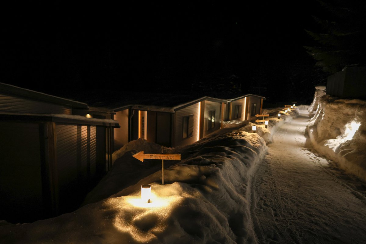 Cabanele Nivalis Resort în zăpadă de iarnă